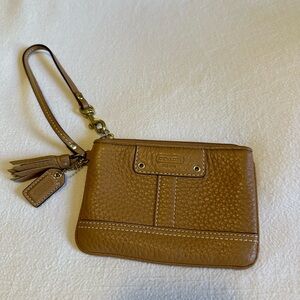 Tan Coach stitched wristlet
